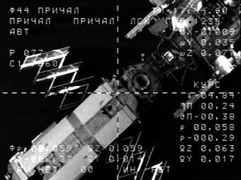 Стыковочный экран "Союза". Кадр NASA TV Стыковочный экран "Союза". Кадр NASA TV