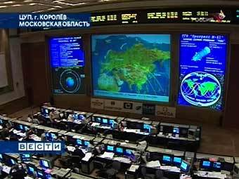 Центр управления полетами. Кадр телеканала "Россия"  Центр управления полетами. Кадр телеканала "Россия"